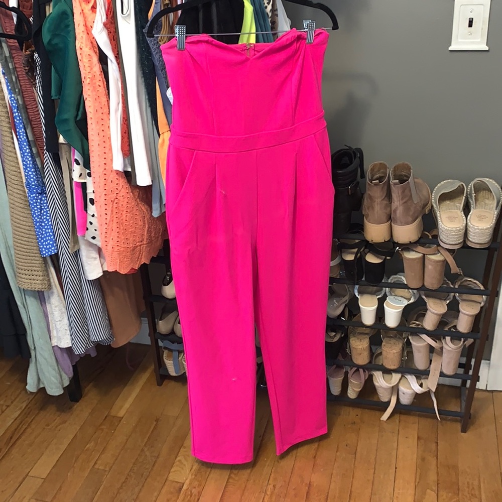 Pink jumpsuit with functional pockets